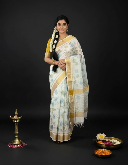 White Kerala Kasavu Saree with Soft Blue and Sage Green Watercolour Lotus Leaf Prints and Gold Border