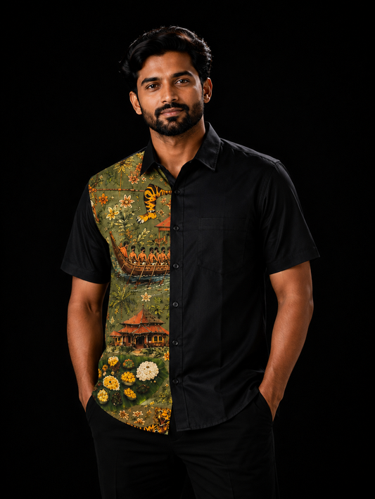 Man wearing a black short-sleeve shirt with an olive-green Kerala art panel on the left featuring snake boat race, Pulikali tiger, Kerala house and floral motifs